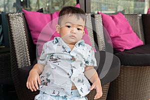 Asian cute baby boy looking