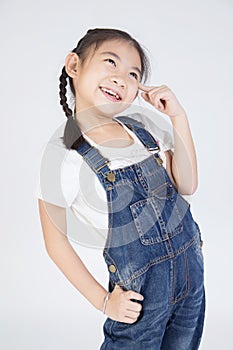 Asian cute girl in jump suit with smile face