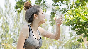 Asian cute sport healthy fit and firm slim teen girl drink water