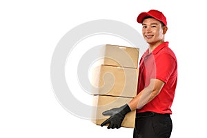 Asian delivery man in red uniform with parcel cardboard box isolated on white background