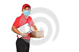 Asian delivery man wearing face mask and gloves in red uniform delivering parcel box