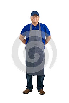 Asian delivery man working in blue shirt with apron isolated white background