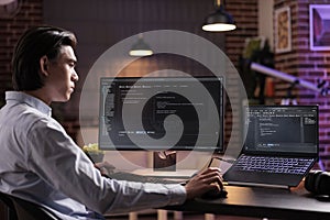 Asian developer using binary code