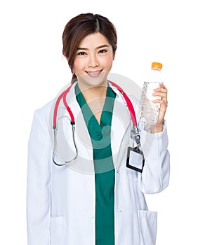 Asian Doctor advertising potable water for patient