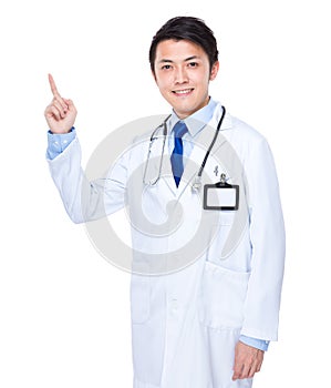 Asian doctor with finger point up