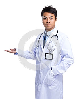 Asian Doctor with hand showing blank sign