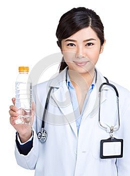 Asian doctor hold water bottle
