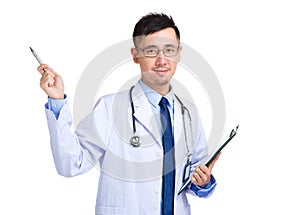 Asian doctor man hold with clipboard and pen point up