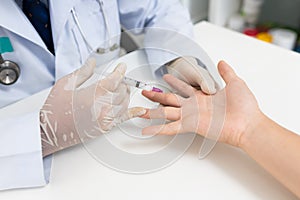 Asian doctor or nurse hands with syringe injecting to palm medical. Carpal tunnel syndrome, arthritis, neurological disease
