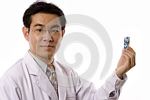 Asian Doctor With Pills