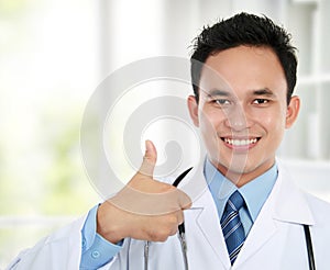 Asian doctor showing okay gesture