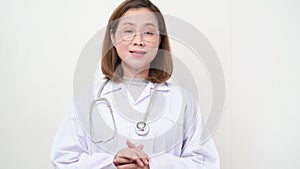 Asian doctor talking to patient via video call, looking at camera make video chat conference call