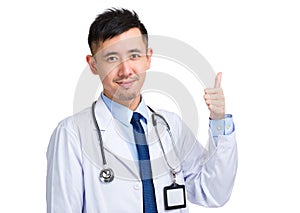 Asian doctor with thumb up