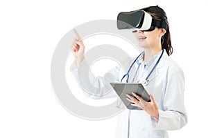 Asian doctor use digital tablet press VR headset screen