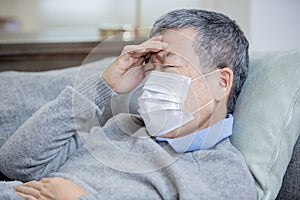 Asian eldely man feel headache