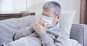 Asian eldely sick man cough