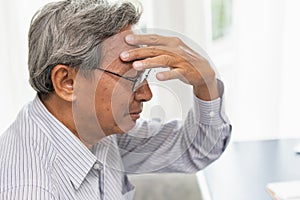 Asian elder headache pain suffer from stress