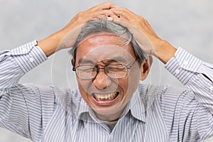 elder suffer from stroke and powerful headache or brain attack photo