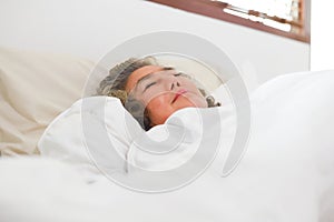 Asian Elderly woman sleep and sweet dream on bed