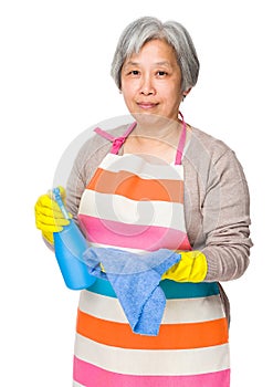 Asian elderly woman use of detergent fo cleaning