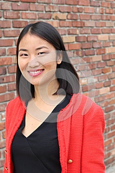 Asian elegant woman smiling close up