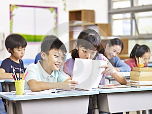 Asian elementary school students in classroom