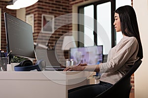 IT engineer using software app with encryption