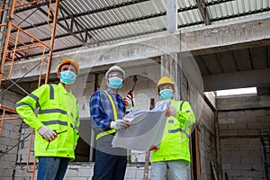 Asian engineer technician team introduction and supervise of workers to build a house in the construction site