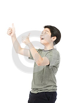 Asian excited boy in green-shirt giving thumbs-up