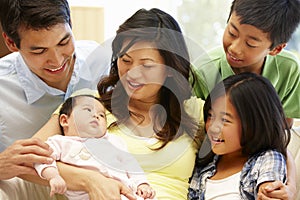 Asian family with baby