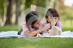 Asian family children elder sister comforts her younger sister