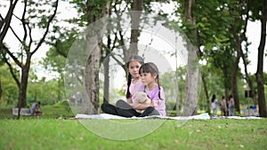 Asian family children elder sister comforts her younger sister