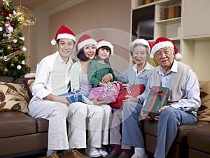Asian family with christmas Hats