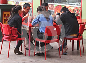 Asian couples are eating together in Chinatown in Adelaide, Australia