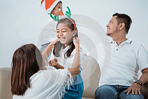 Asian family enjoying christmas day together