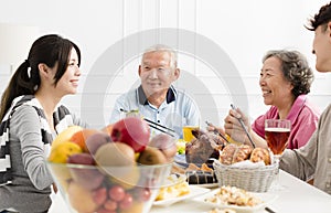 Asian family having dinner together