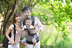 asian Family hiking in forest and jungle