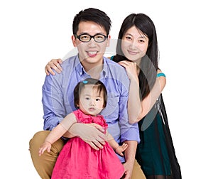 Asian family with mother, father and baby daughter