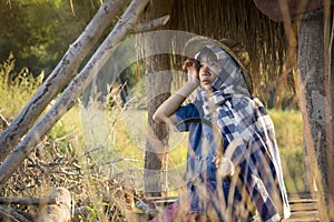 Asian farmer girl working at rice field on harvest season