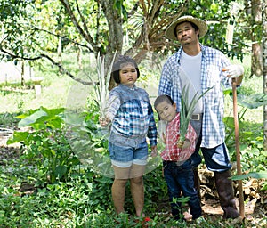 Asian farmers are teaching their children to care for the plants with patience and effort.