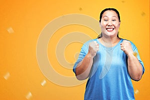Asian fat overweight woman with an excited expression