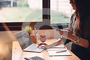 Asian female accountant analyze and discuss the situation on the financial report in meeting room. Financial,accounting,investment photo