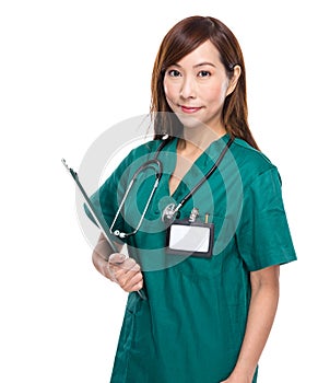 Asian female doctor with clipboard