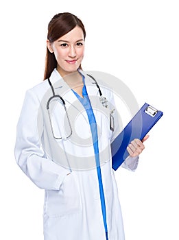Asian female doctor with clipboard