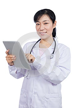 Asian female doctor holding a tablet