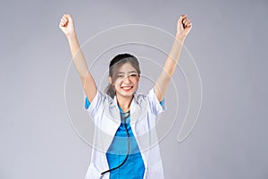 The asian female doctor showed feelings of victory photo