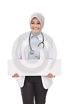 Asian female doctor with stethoscope holding blank white board