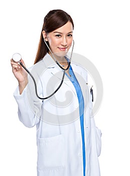 Asian female doctor use stethoscope