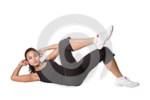 Asian female doing sit ups