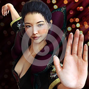 Asian female, fighter practicing martial arts in traditional costume with a bokeh background . Kung fu and karate pose.